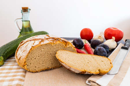 Polish bread on a country table. Plum taste of summer. A home-made breakfast. Europe, Poland, Mazovia.の写真素材