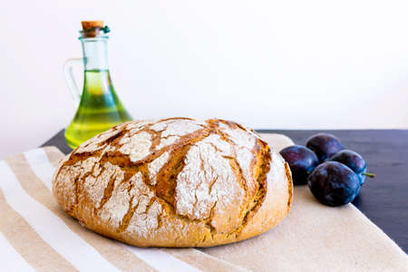 Polish bread on a country table. Plum taste of summer. Europe, Poland, Mazovia.の写真素材