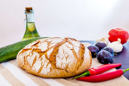Polish bread on a country table. Plum taste of summer. Europe, Poland, Mazovia.の写真素材
