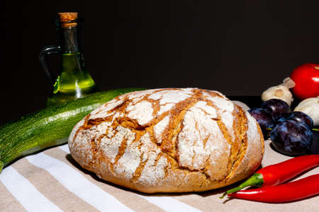 Polish bread on a country table. Plum taste of summer. Europe, Poland, Mazovia.の写真素材