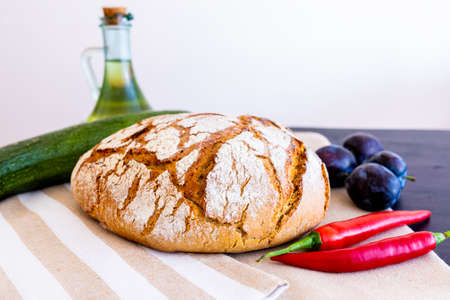 Polish bread on a country table. Plum taste of summer. Europe, Poland, Mazovia.の写真素材