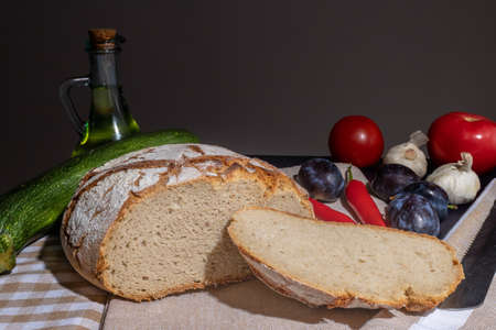 Polish bread on a country table. Plum taste of summer. A home-made breakfast. Europe, Poland, Mazovia.の写真素材