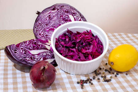 Red cabbage salad. Red vegetables. Cabbage head. Healthy meals. Salad bowl. Vitamin Table. Addition to dinner. Vegan flavors. Vegetables for salad.の写真素材
