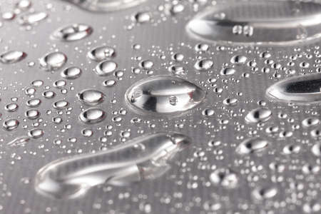 Water drops closeup. Wet background. Water theme. After rain.の写真素材