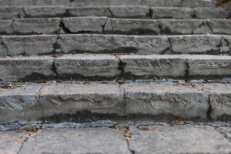 Old stairs in the park. Ruined concrete stairs.  Destroyed path.の写真素材