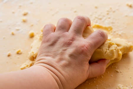 Hand kneading dough. Homemade sweet cake. Family pastries. Tart weekend. Pastries for Christmas. Man...