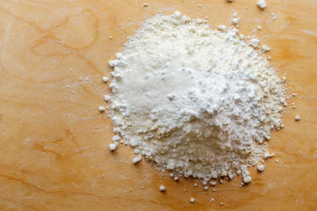 Products for dough, flour, sugar on the board. Homemade pastries. Shortbread.の写真素材