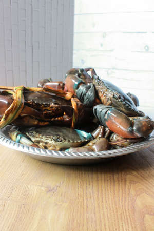 Photo of Pile of Mangrove Crab prepared for cleaning and cookingの写真素材