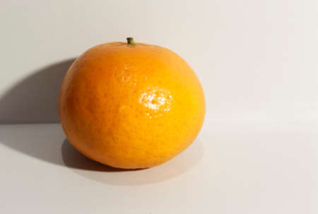 Photo of isolated orange fruit on white background. Eruk contains Vitamin C which is very good for healthの写真素材