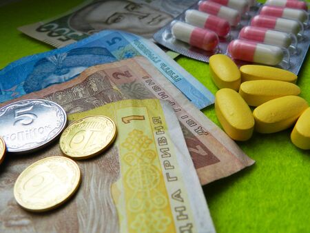 Macro photo background of pills and moneyの写真素材