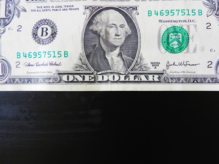 One dollar banknote with black text area on the bottomの写真素材