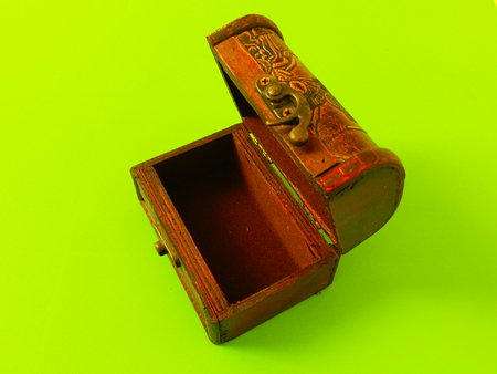 Open chest on the green background
