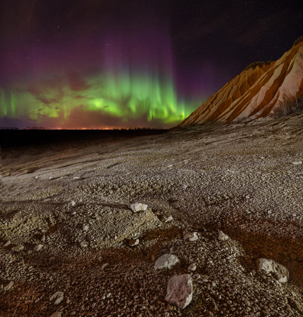 Panorama of Aurora polaris above mountains. Russiaの写真素材