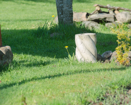 Ancient vase as a variant of garden decorの写真素材