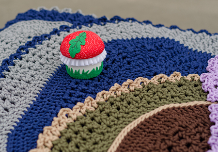 knitted mushroom at the fair of handmade productsの写真素材