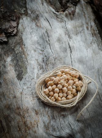 Spilled chickpeas on a rustic wooden. Garbanzo beansの写真素材