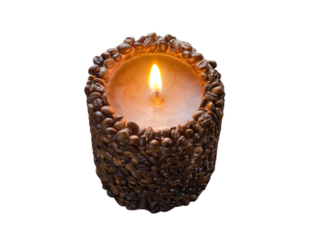 Burning aromatic coffee candle and coffee beans, isolatedの写真素材