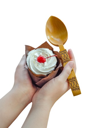 Cottage cheese cake with cherries and cream on woman hands isolated on white background.の写真素材
