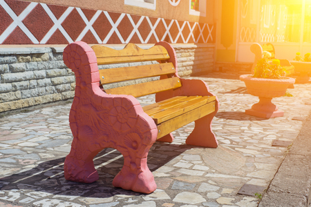 Empty pink bench in tulip flowers gardenの写真素材