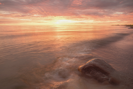 Majestic summer sunset over the Chudskoy lake. Estonia.の写真素材
