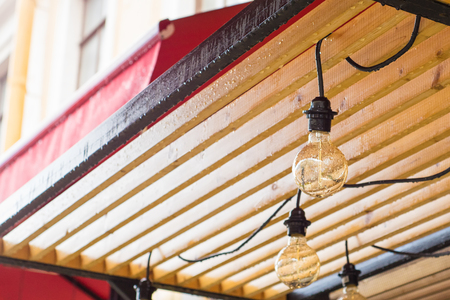 The lamp on the background in the cafe.の写真素材