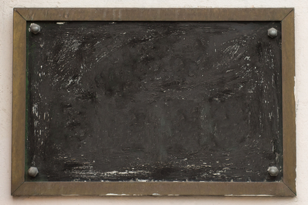 Vintage bulletin Square board. aged dirty street wall background.の写真素材