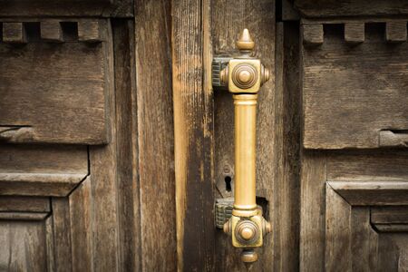 Antique vintage brown wooden door close upの写真素材