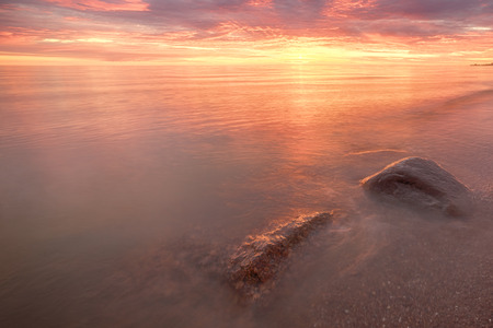 Majestic summer sunset over the Chudskoy lake. Estonia.の写真素材