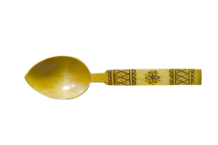 A wooden spoon isolated on white background.の写真素材