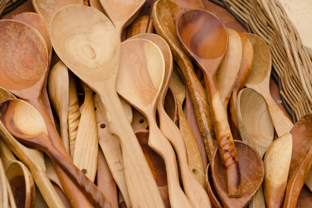 Handmade brown wooden spoons at fair. Russiaの写真素材
