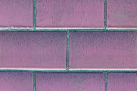 Abstract textured background: old pink brick wall patternの写真素材