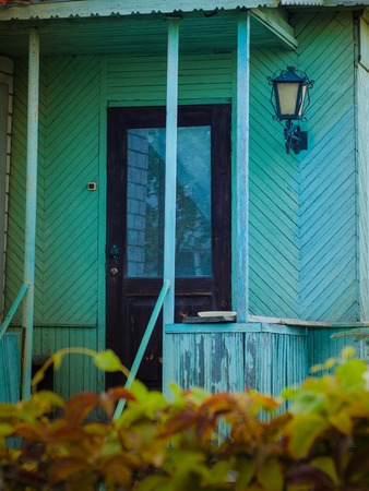 facade of the old cyan wooden houseの写真素材