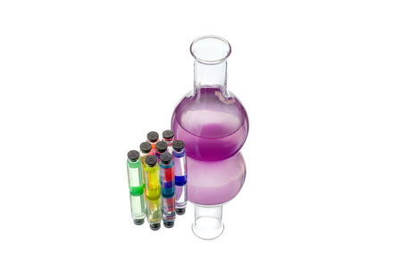 Laboratory glassware with samples on white background.の写真素材