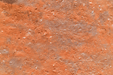 A beautiful old orange venetian decorative stucco texture for backgroundsの写真素材