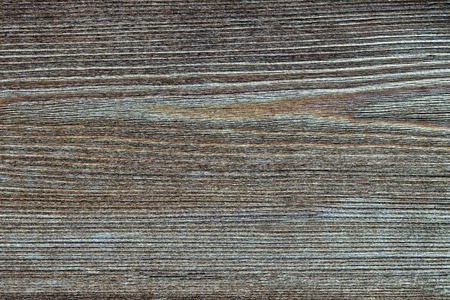 Dark wooden background. Autentic board. Top viewの写真素材