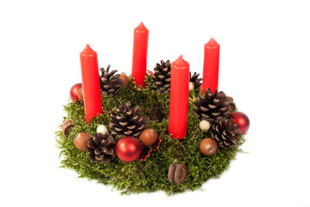 traditional home made advent wreath isolated on the white background.の写真素材