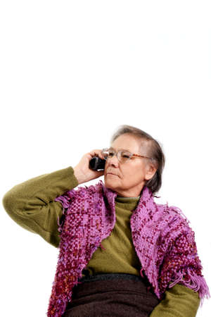 portrait of a mature woman using telephoneの写真素材