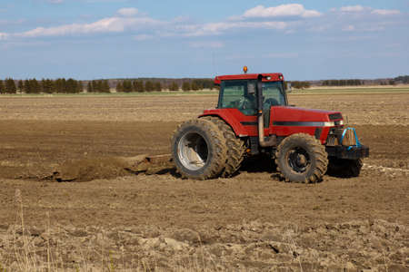 Agriculture.  tractor plowing the fields