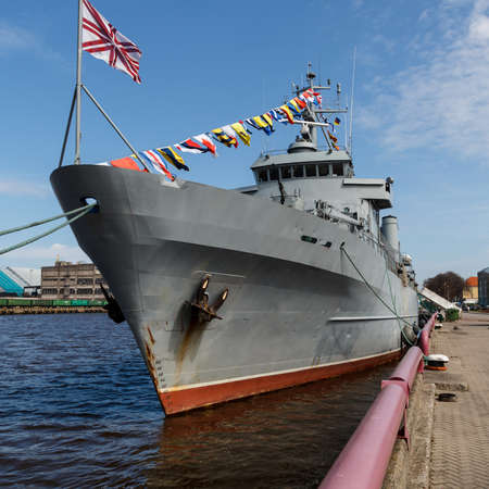warship docked at the harborの写真素材