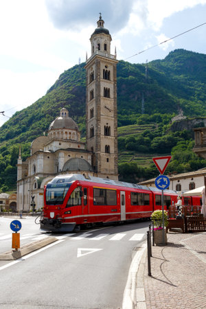 Swiss mountain train Bernina Express arrive at Italian city Tiranoのeditorial素材