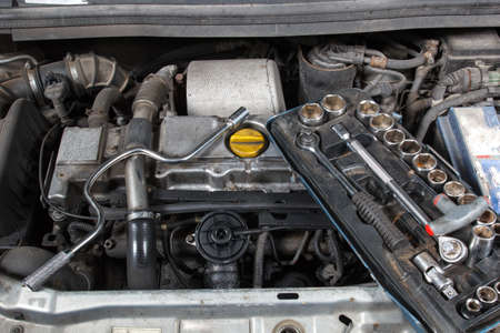 old diesel engine repair, EGR valve changeの写真素材
