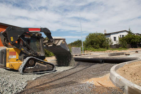 Construction of a new street in suburban districtの写真素材