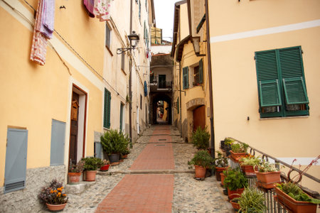 An alley surrounded by old building in Ventimiglia Italyのeditorial素材