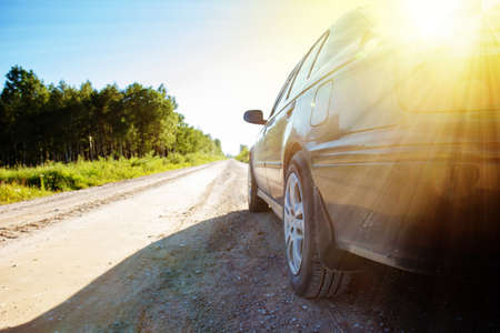 car on rural roadの写真素材