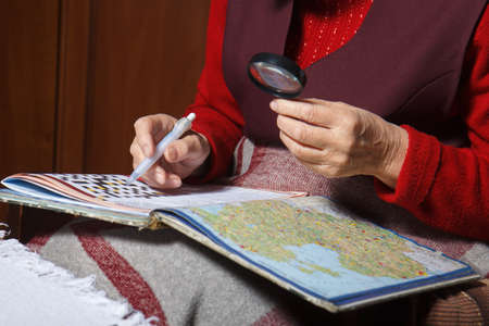 senior women solve crosswordsの写真素材