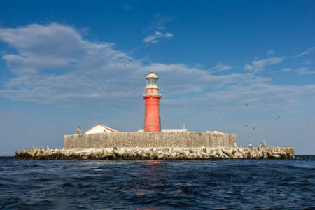 The Kolka lighthouse is on an artificial island in six kilometres from Kolkasrags.の写真素材