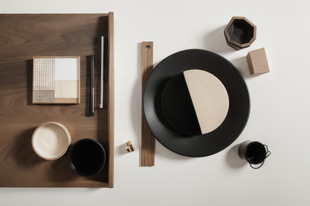 Flat lay composition of creative black architect moodboard with samples of building, textile and natural materials and personal accessories. Top view, black backgroung, template.の素材