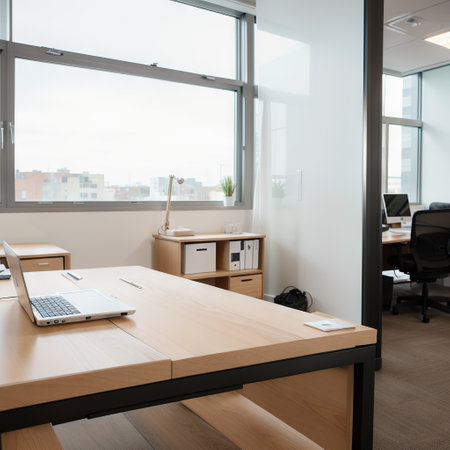 Modern business office without with blurred bokeh background. tables, chairs, computers. copy space. High quality photoの素材