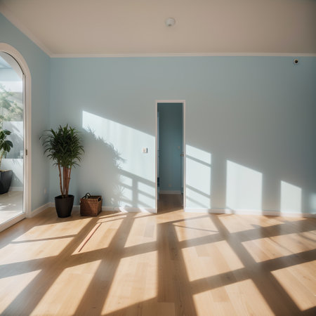 Light blue empty wall and smooth floor with interesting light glare. Background for the presentation.の素材