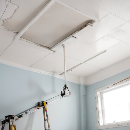 yman painting ceiling with white dye indoors space for textの素材